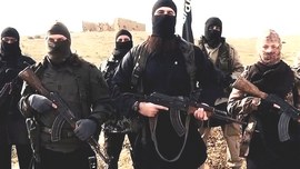 Mandatory Credit: Photo by REX USA (2642870a) Hayat Boumeddiene, far right Hayat Boumeddiene 'appears in Islamic State film' - 06 Feb 2015 The latest video released by French-speaking Islamic state (ISIS), fighters may be Hayat Boumeddiene, who is believed to have knowledge about the deadly January 9, 2015 attack on a Paris kosher grocery,The video, titled "Blow Up France 2," was released Tuesday and shows an ISIS fighter praising previous attackers in France and calling for new attacks. The video shows a woman standing next to the speaker, wearing camouflage clothing and holding a weapon. French authorities are investigating the possibility this woman could be Hayat Boumeddiene. Her husband, Amedy Coulibaly, killed four hostages January 9 at a kosher grocery in Paris, authorities said. He was killed by police in a rescue and the remaining hostages fled to safety.